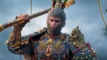 Black Myth Wukong release times: a big monkey man in armor holding a giant staff