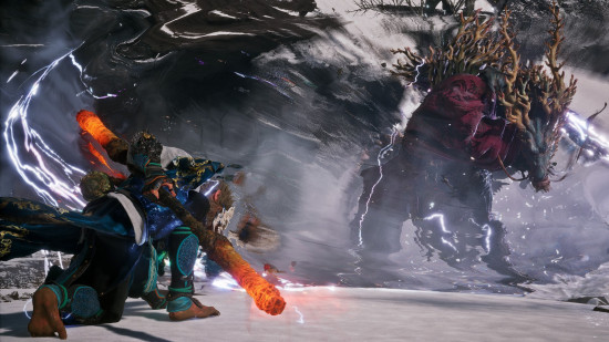 Black Myth Wukong review: The Destined One stays low to the ground, his staff glowing fiery red as an electric dragon in a wizard robe advances in a plume of electricity.