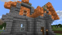 Minecraft copper: a house with a copper ore roof