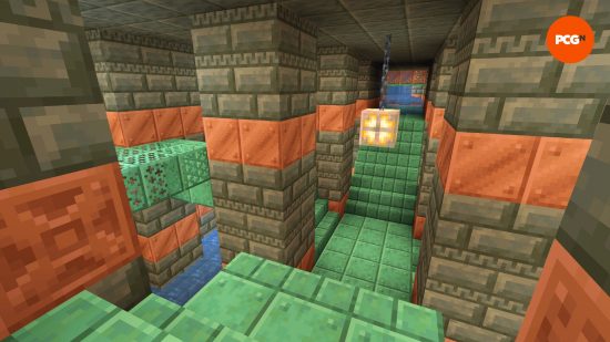 the copper and stone interior of a Minecraft Trial Chamber that can be found in one of the best 1.21 Minecraft seeds.