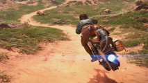 Kay Vess rides her speeder across a dry, warm planet in Star Wars Outlaws early access.